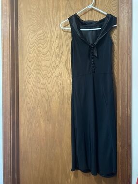 The limited beautiful classy black sleeveless dress size 4 EUC
